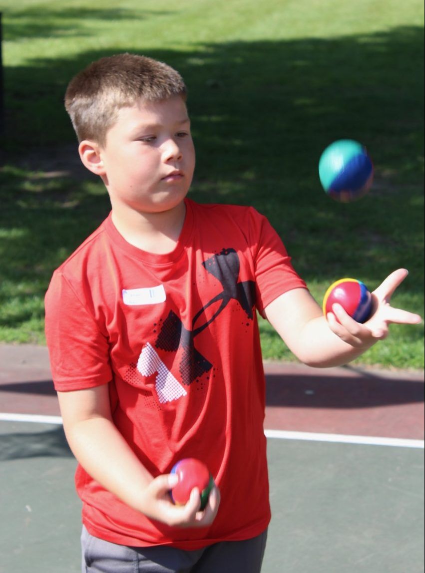 Toss Juggling at a Cirque Amongus program