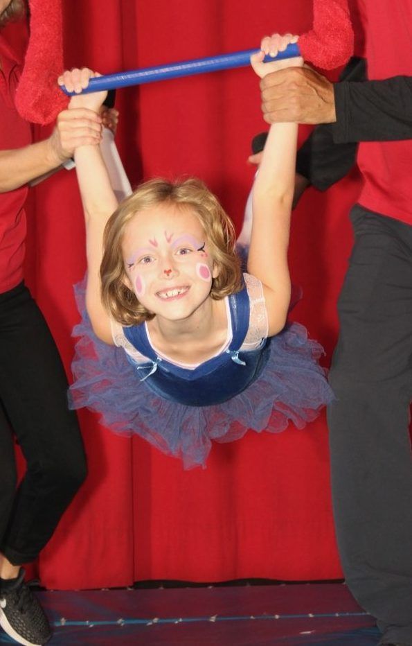 Trapeze at a Cirque Amongus program
